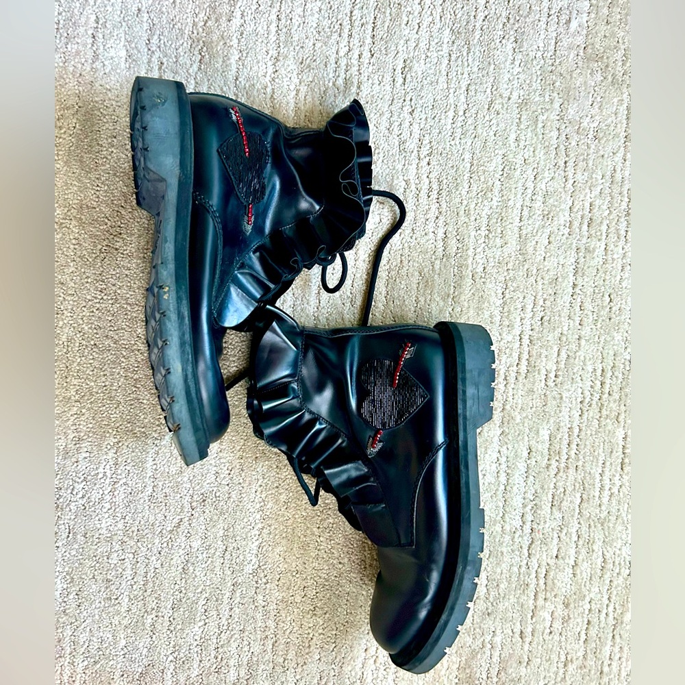 VALENTINO black ruffled Chelsea boot.